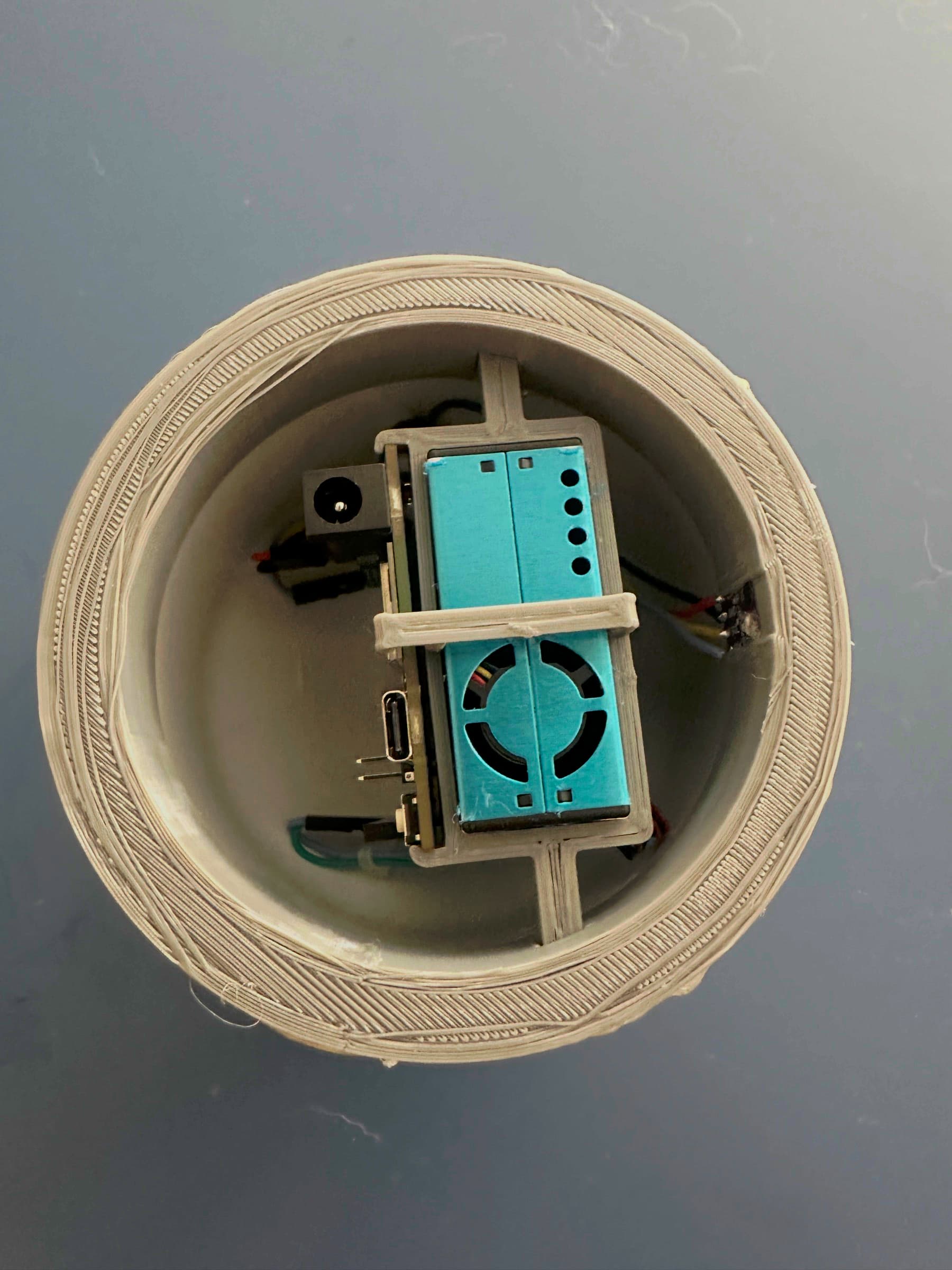 Looking into the PVC enclosure at the particulate matter sensor